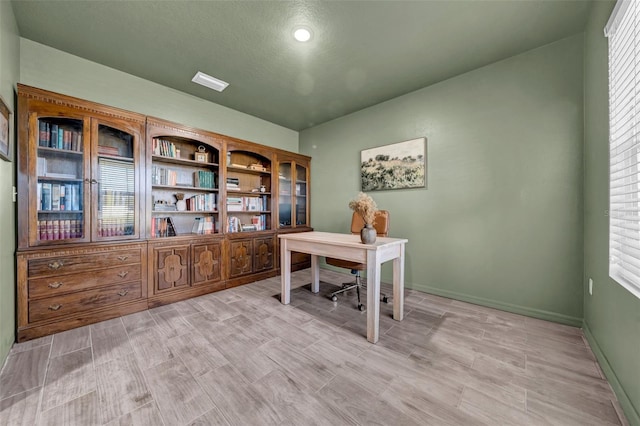 home office featuring baseboards