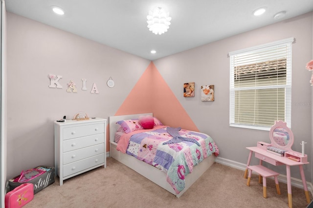 carpeted bedroom featuring baseboards and recessed lighting