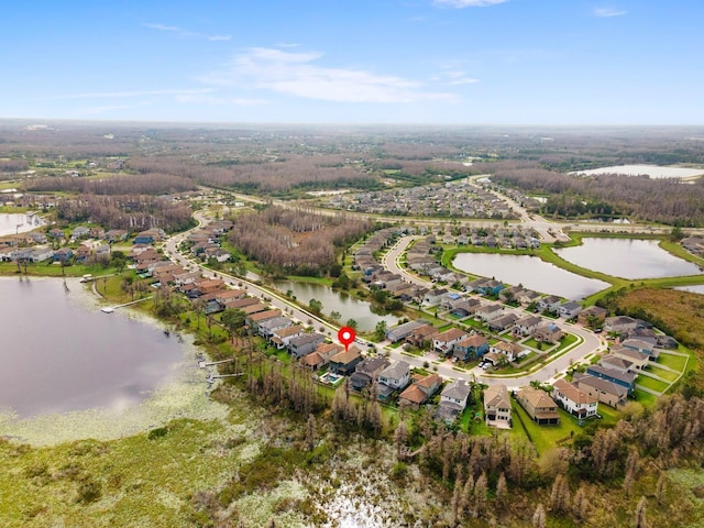 aerial view with a water view and a residential view