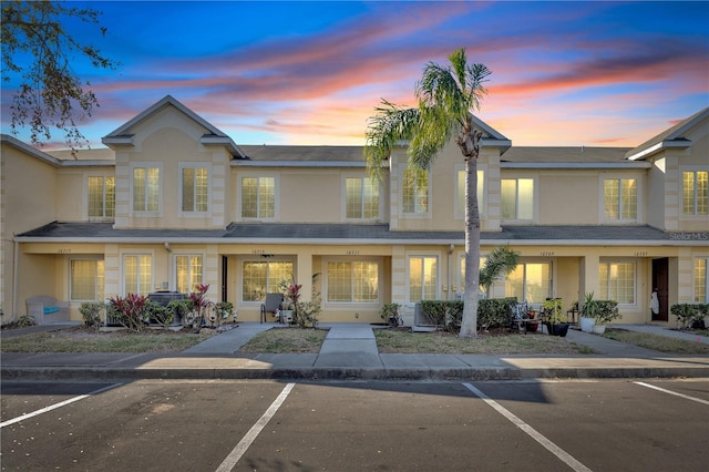 view of property featuring stucco siding