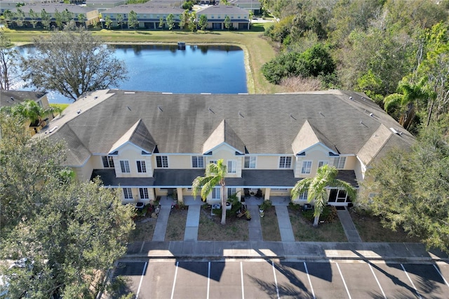 drone / aerial view with a water view