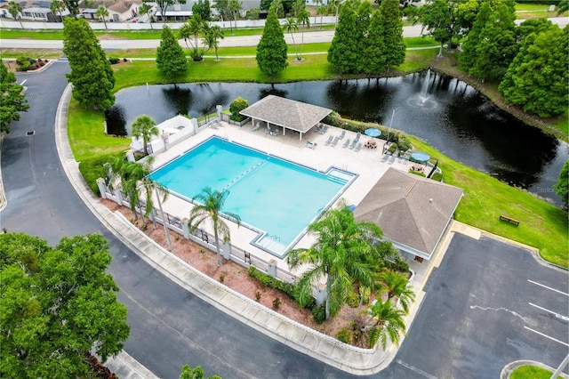 birds eye view of property featuring a water view