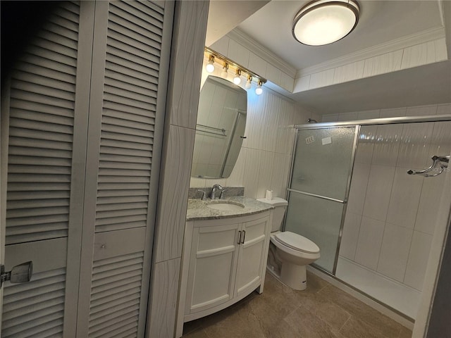 1433 S Belcher Rd Unit A12, Clearwater, FL 33764 - bathroom featuring crown molding, toilet, vanity, a stall shower, and a closet