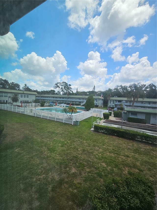 1433 S Belcher Rd Unit A12, Clearwater, FL 33764 - view of yard featuring a community pool