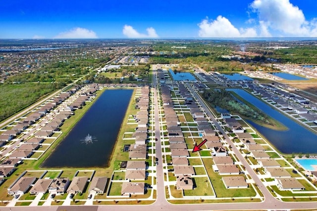 drone / aerial view with a water view