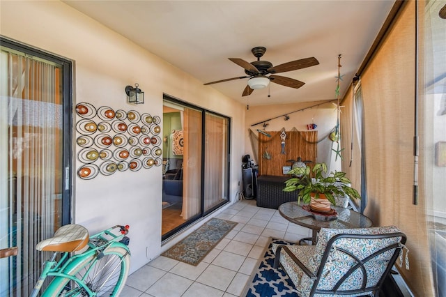 sunroom / solarium with ceiling fan