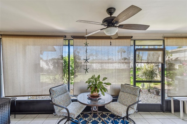 sunroom with plenty of natural light and ceiling fan