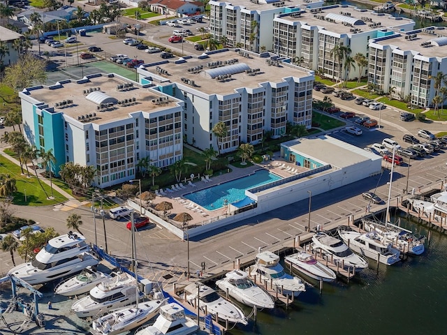 birds eye view of property featuring a water view