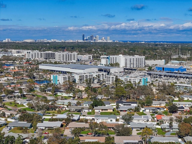 birds eye view of property with a view of city