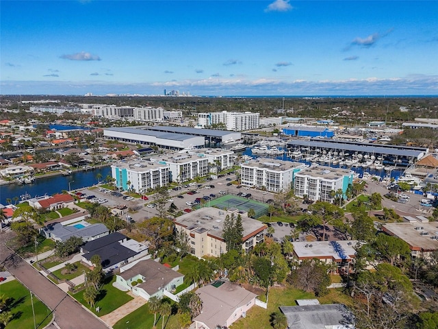 bird's eye view featuring a water view and a city view