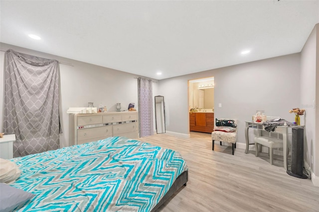 bedroom with recessed lighting, baseboards, and wood finished floors