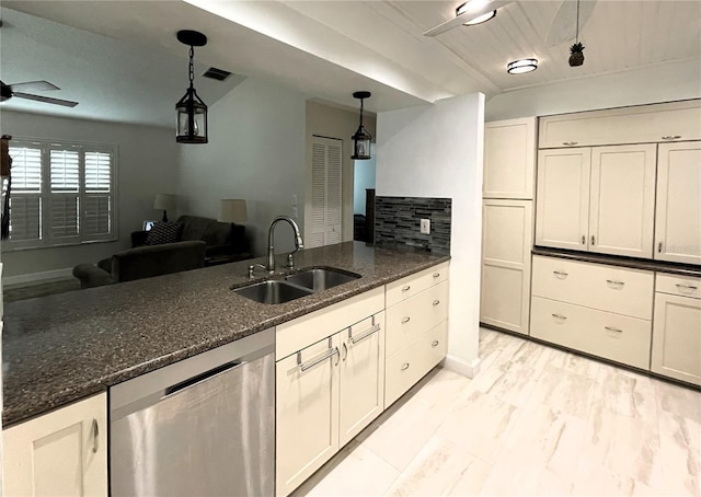 kitchen featuring dishwasher, a sink, visible vents, and pendant lighting