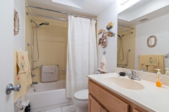 bathroom featuring shower / tub combo with curtain, visible vents, toilet, vanity, and tile patterned floors