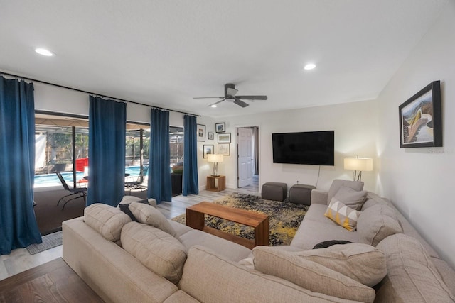 living room with light wood-style floors, recessed lighting, and ceiling fan