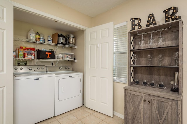 720 Earls Ct, Safety Harbor, FL 34695 - laundry area featuring laundry area, light tile patterned flooring, and washer and dryer