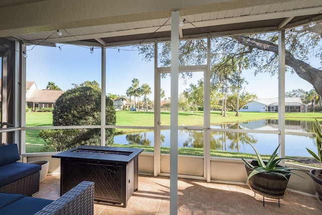 720 Earls Ct, Safety Harbor, FL 34695 - sunroom / solarium featuring a water view and a wealth of natural light