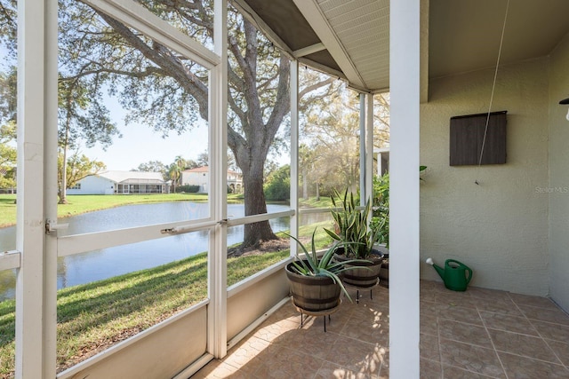 720 Earls Ct, Safety Harbor, FL 34695 - sunroom / solarium featuring a water view