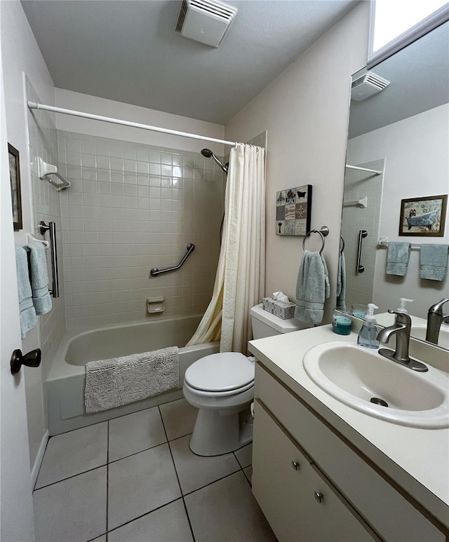 bathroom featuring toilet, shower / bath combo with shower curtain, tile patterned flooring, and visible vents