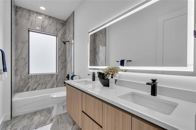 full bath with  shower combination, marble finish floor, a sink, and double vanity