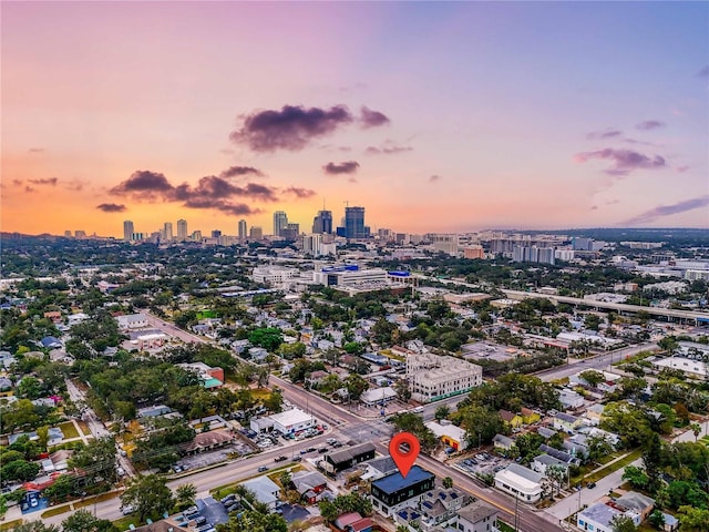 birds eye view of property featuring a city view