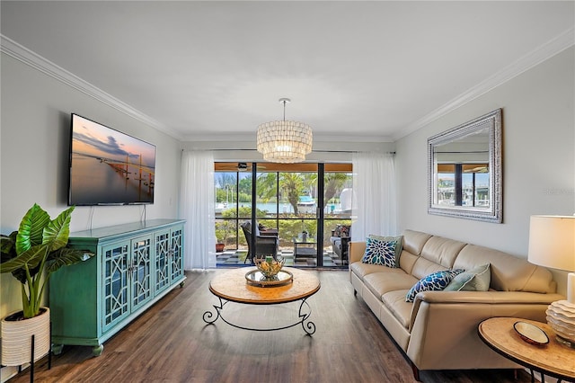 living room with a notable chandelier, crown molding, and wood finished floors