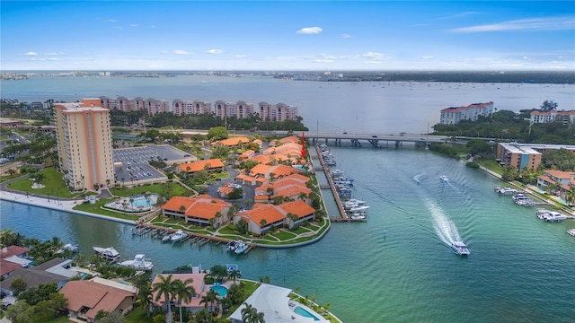 drone / aerial view with a view of city and a water view