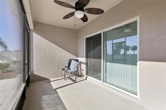 balcony featuring a ceiling fan