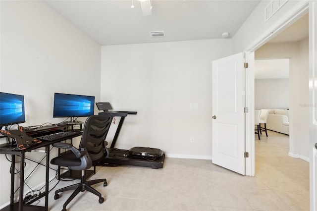home office featuring visible vents, baseboards, and light tile patterned floors