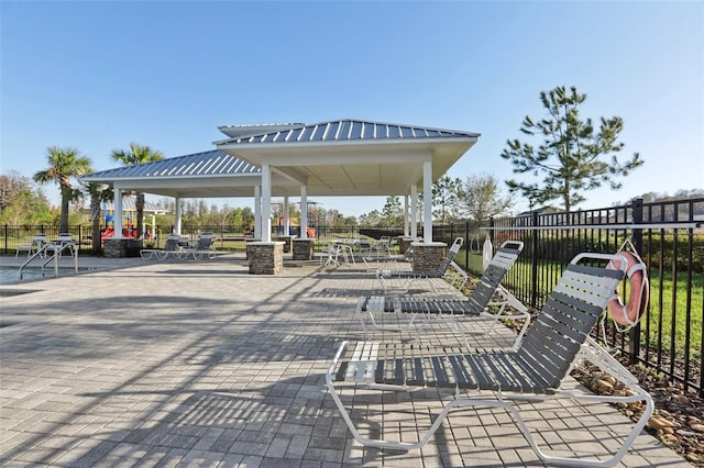 view of community featuring a gazebo and fence