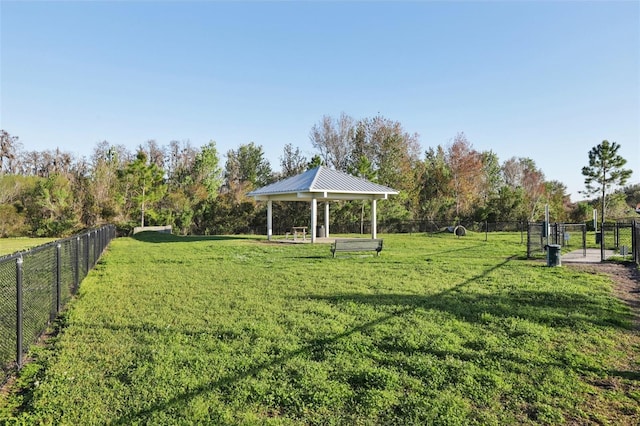 view of yard featuring a gazebo and fence