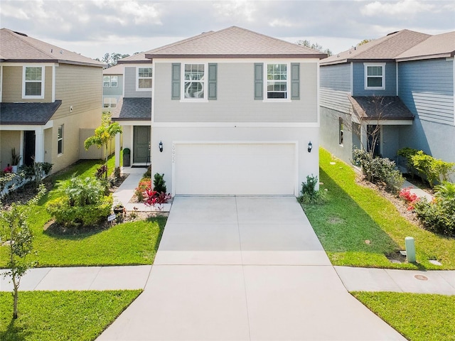 view of front of home featuring concrete driveway, roof with shingles, an attached garage, a front lawn, and stucco siding