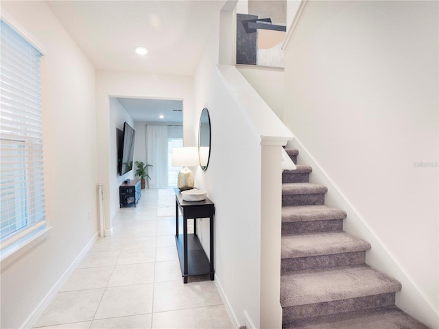 29922 Marquette Ave, Wesley Chapel, FL 33545 - stairs with recessed lighting, baseboards, and tile patterned floors