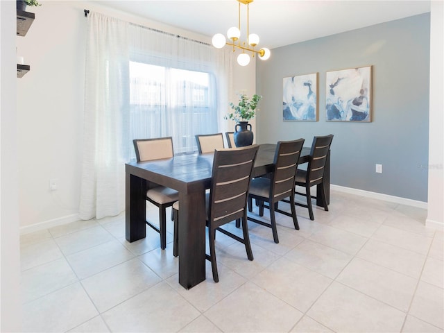 29922 Marquette Ave, Wesley Chapel, FL 33545 - dining space with baseboards, light tile patterned flooring, and a notable chandelier