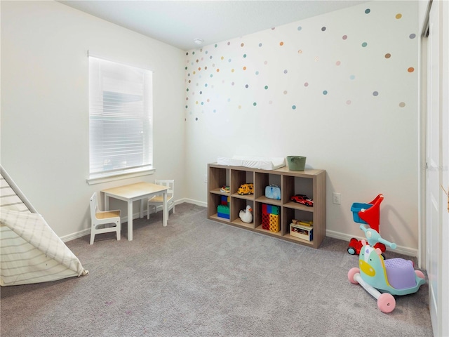 29922 Marquette Ave, Wesley Chapel, FL 33545 - rec room with carpet flooring and baseboards