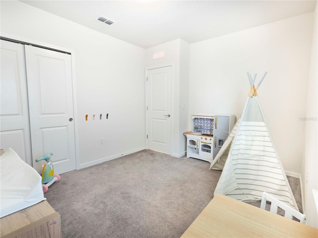 29922 Marquette Ave, Wesley Chapel, FL 33545 - rec room with carpet floors, visible vents, and baseboards