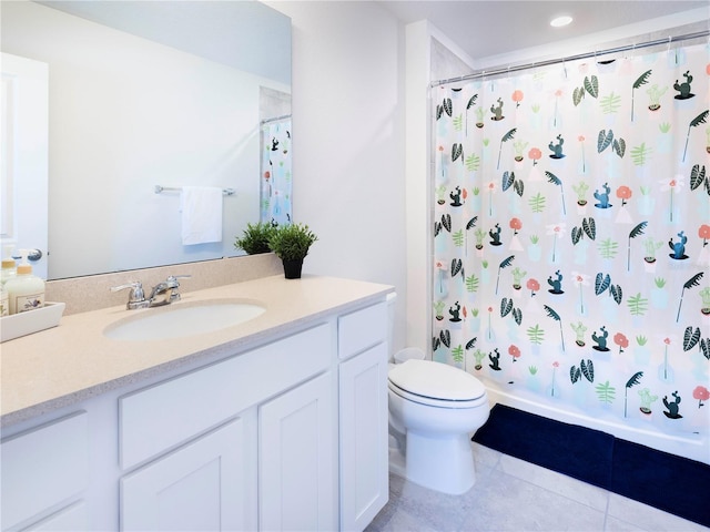 29922 Marquette Ave, Wesley Chapel, FL 33545 - full bathroom featuring toilet, vanity, shower / bath combo with shower curtain, and tile patterned floors
