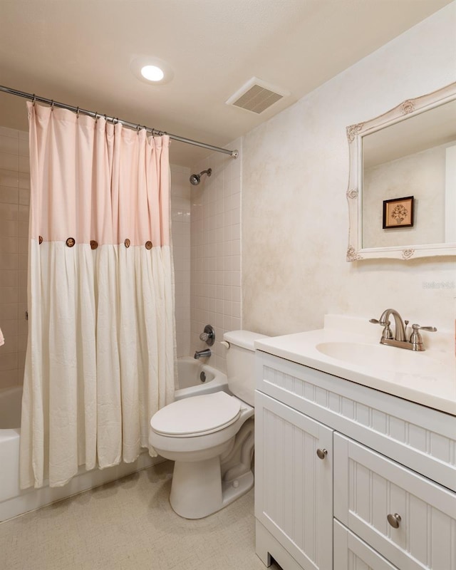 full bath with visible vents, vanity, toilet, and shower / tub combo with curtain