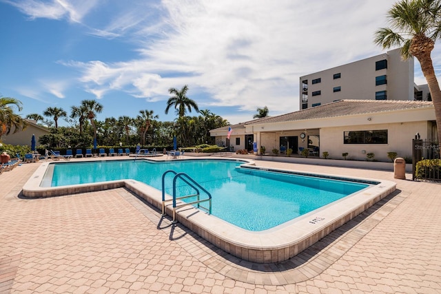 pool featuring a patio area