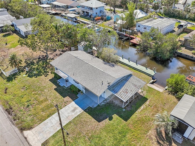 aerial view with a residential view and a water view