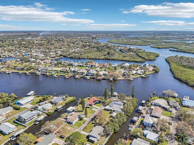 bird's eye view with a water view and a residential view