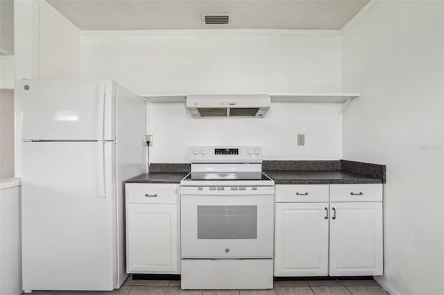 kitchen with white appliances, dark countertops, exhaust hood, and visible vents