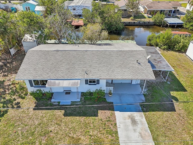 aerial view featuring a water view and a residential view