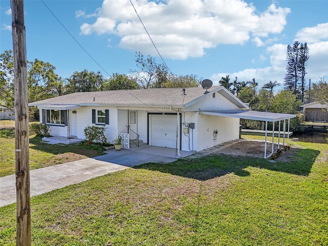 ranch-style home featuring driveway, a carport, a front lawn, and an attached garage