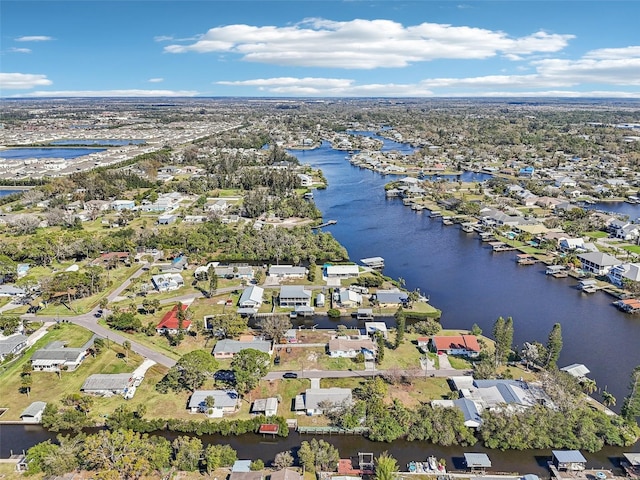 aerial view featuring a water view and a residential view