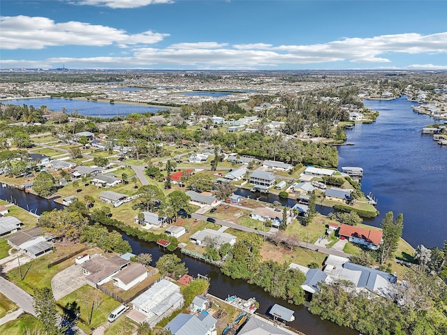 bird's eye view with a residential view and a water view