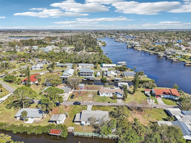 aerial view with a water view and a residential view