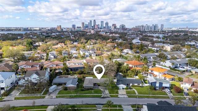 birds eye view of property featuring a city view