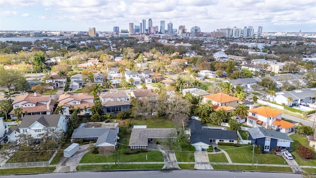 drone / aerial view with a residential view and a city view