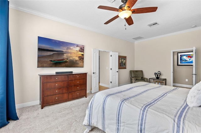 bedroom featuring ornamental molding, light colored carpet, ceiling fan, and baseboards