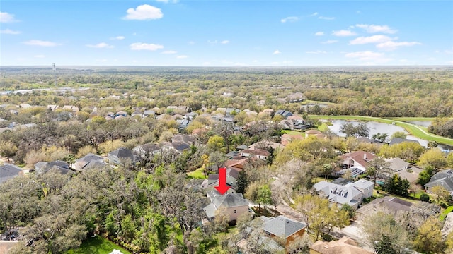 aerial view with a residential view and a water view